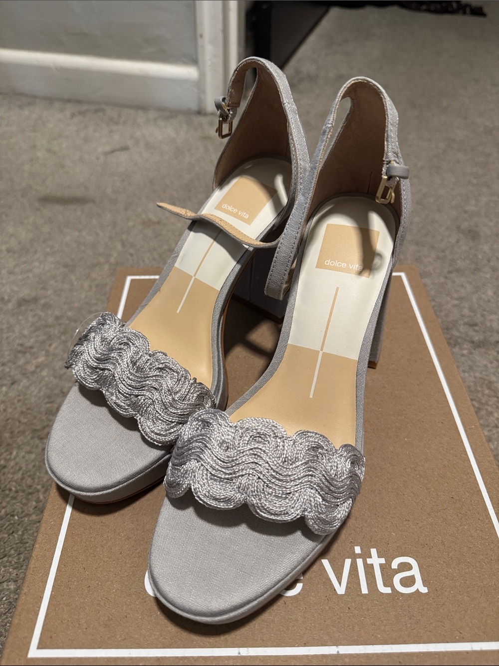 Dolce Vita Silver Braided Strap Block Heel Sandals
Never worn but comfortable!